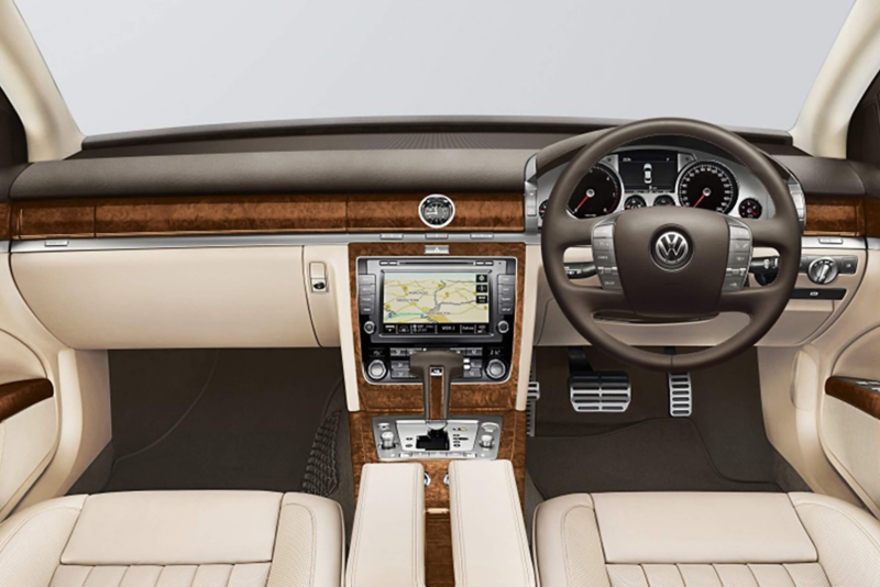 Interior shot of a Volkswagen Phaeton, steering wheel and dashboard.