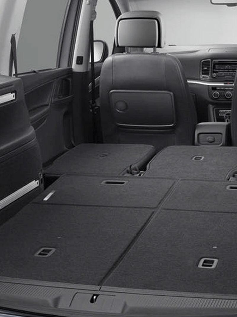 Open boot and folder passenger seats, inside a Volkswagen Sharan.