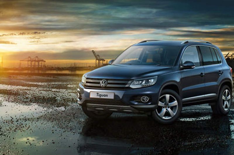 Blue Volkswagen Tiguan, in a docking yard.