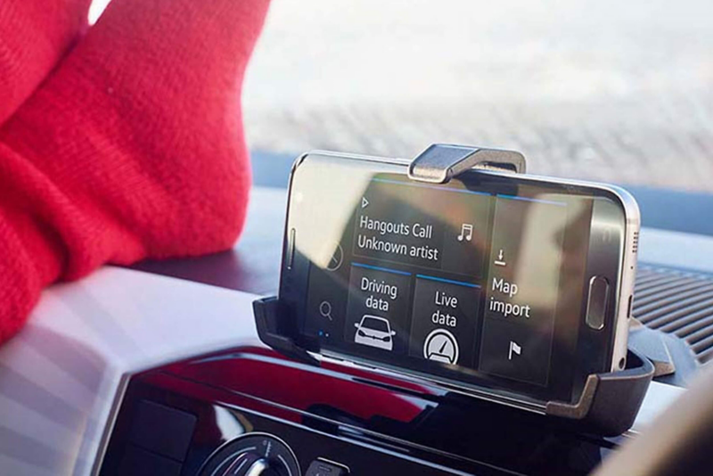 Interior shot, showing a phone sat-nav inside a Volkswagen.