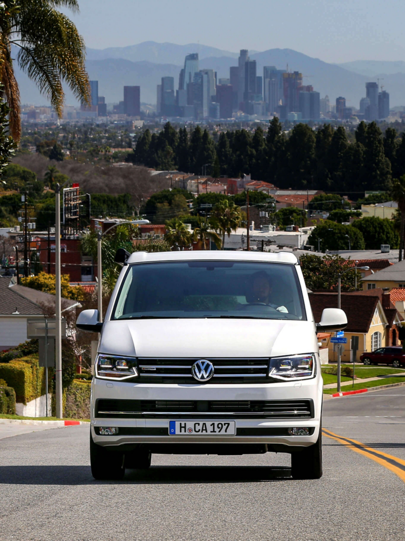 California van driving uphill in California