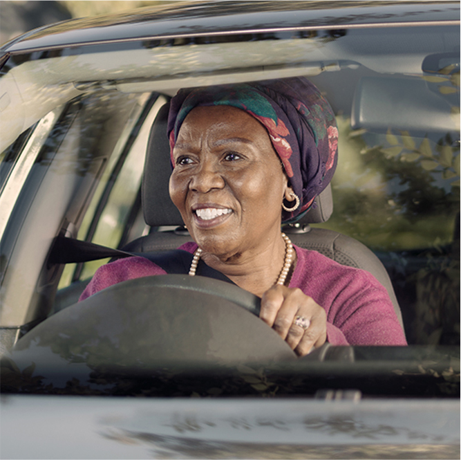 lady driving a vw vehicle