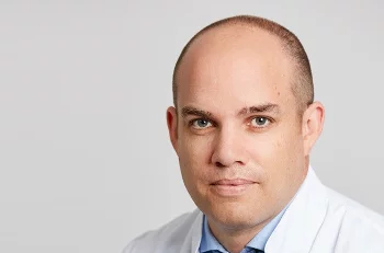 Norman Espinosa, Dr. med.
