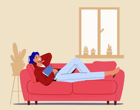 Person liegt gemütlich auf Sofa