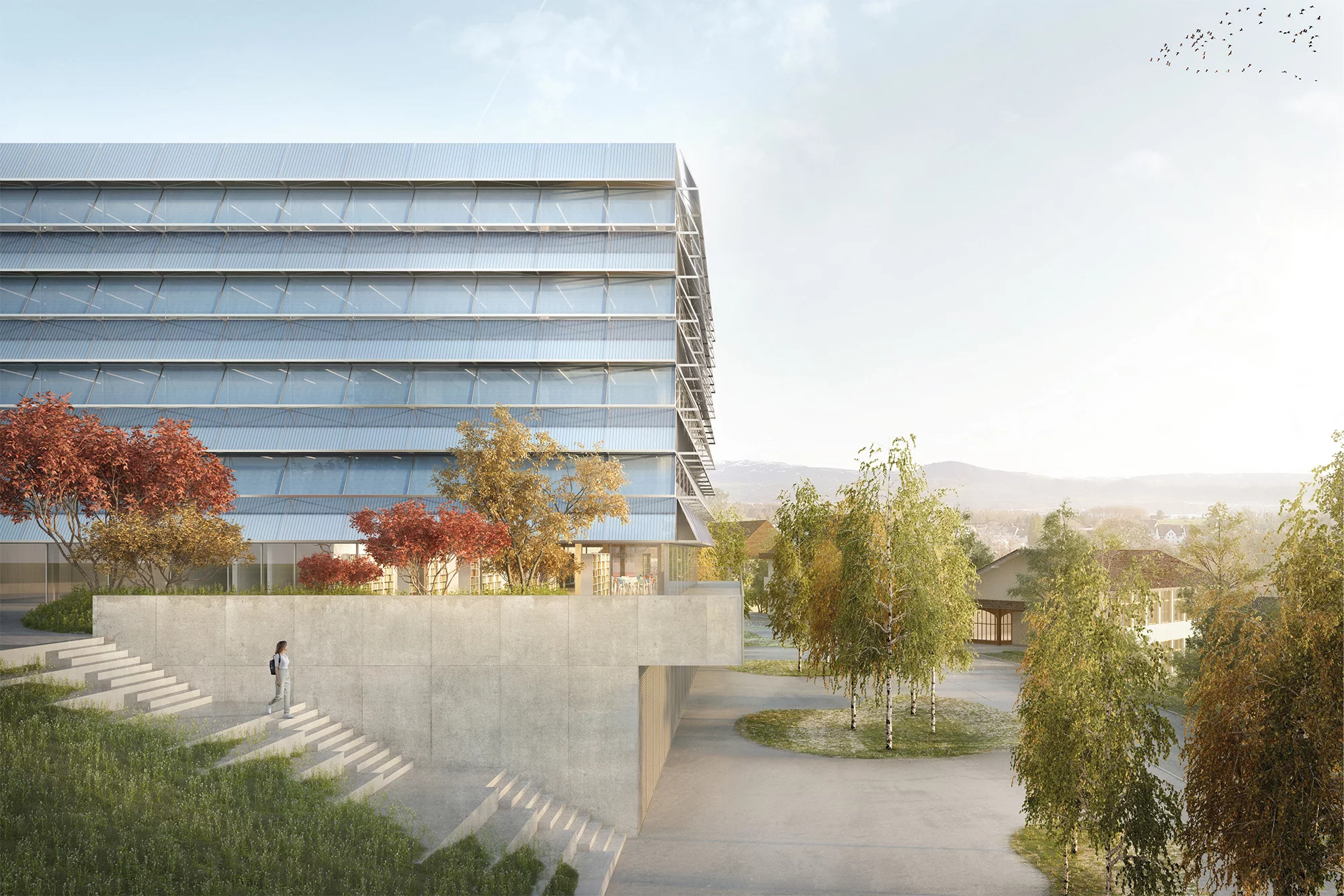 Die Visualisierung des geplanten Bauvorhabens zeigt einen Blick auf die künftige Schulanlage und den Kindergarten.