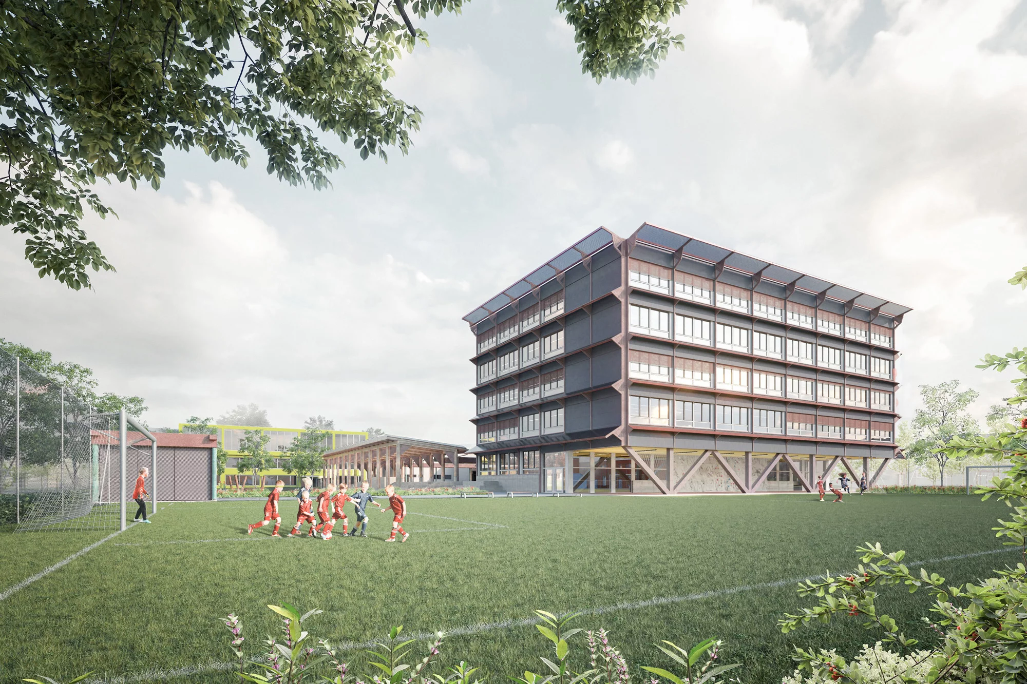 Visualisierung mit Blick über das Rasenspielfeld auf die Schulanlage Luchswiesen.